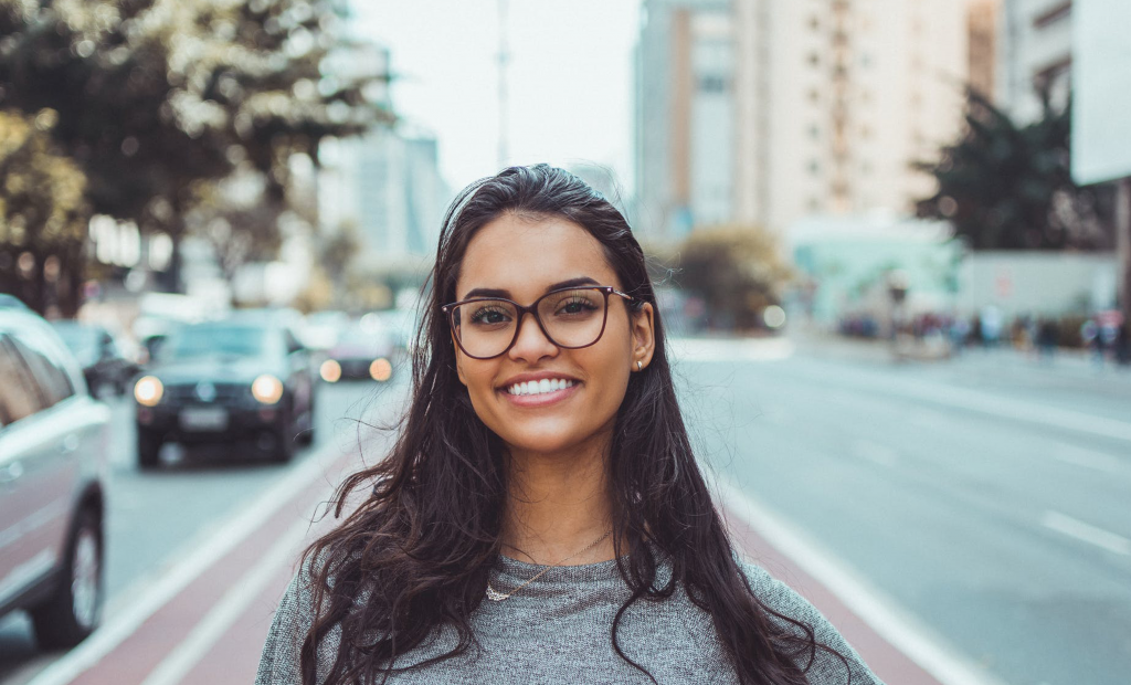 happy woman wearing an eyeglasses
