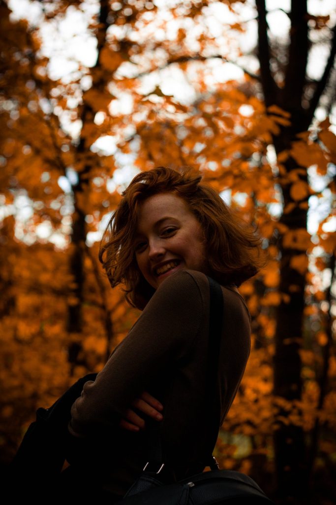 girl posing in the woods