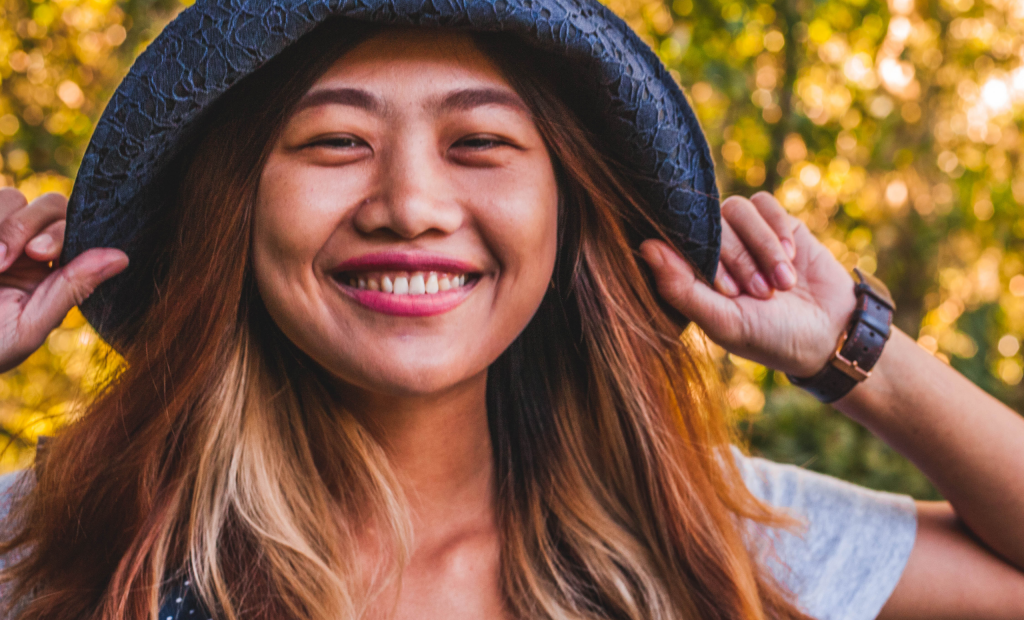 girl wearing a navy blue hat